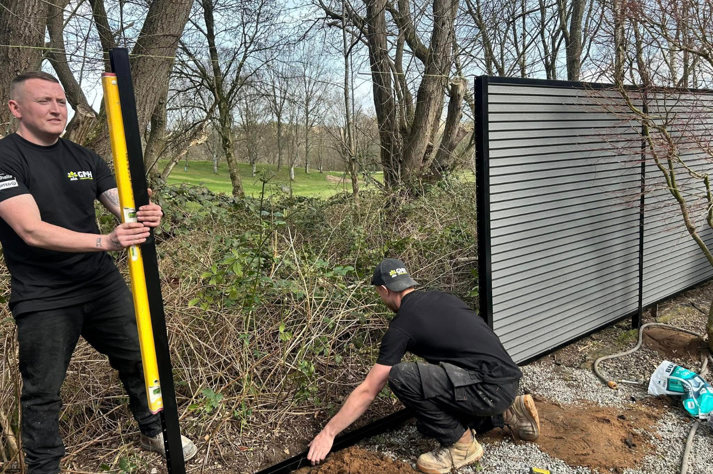 GMH Landscaping Ltd. team designing a beautiful, functional outdoor space in Manchester.